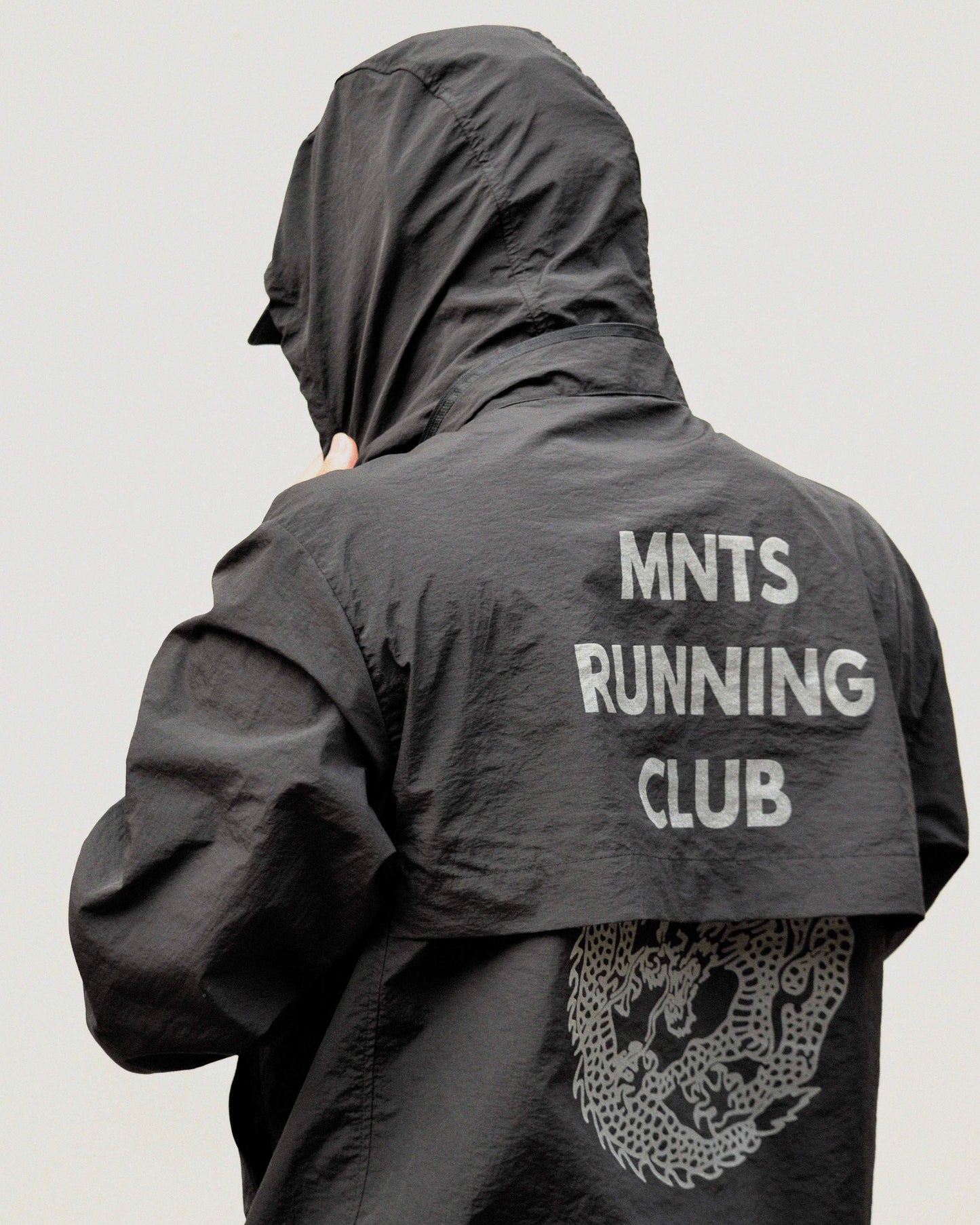 MNTS RUNNING CLUB WINDBREAKER/ BLACK