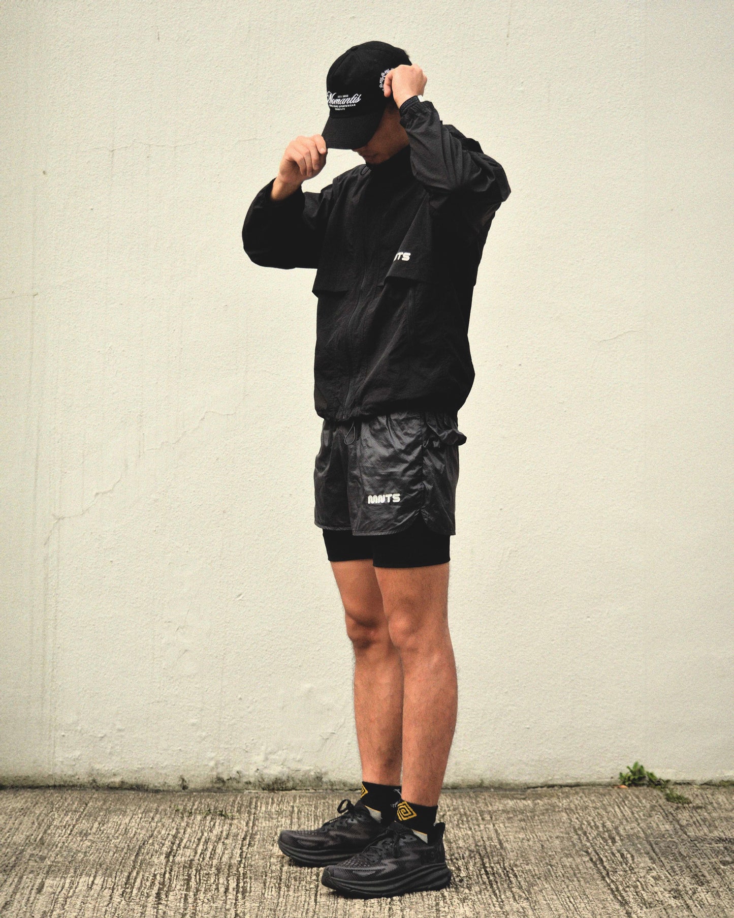 MNTS RUNNING CLUB WINDBREAKER/ BLACK